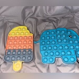 Lot of 2 multicolored silicone pop fidget toys